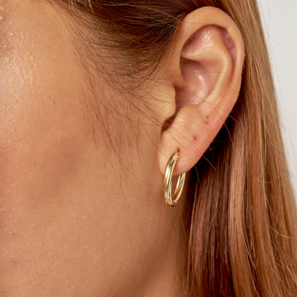 9 Carat Gold Twist Oval Hoop Earrings