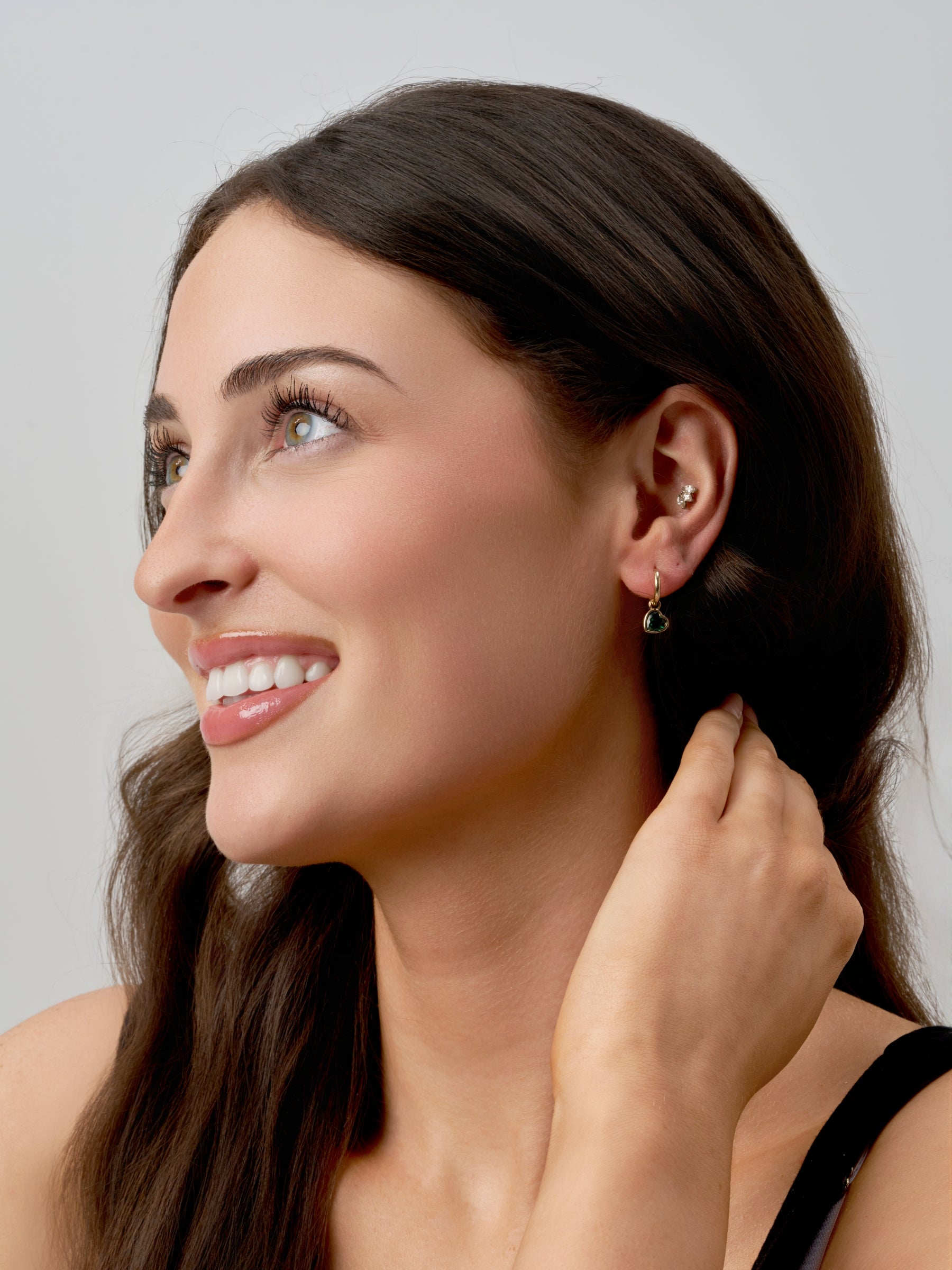 Gold Coloured Heart Charm Huggie Earrings | Evie