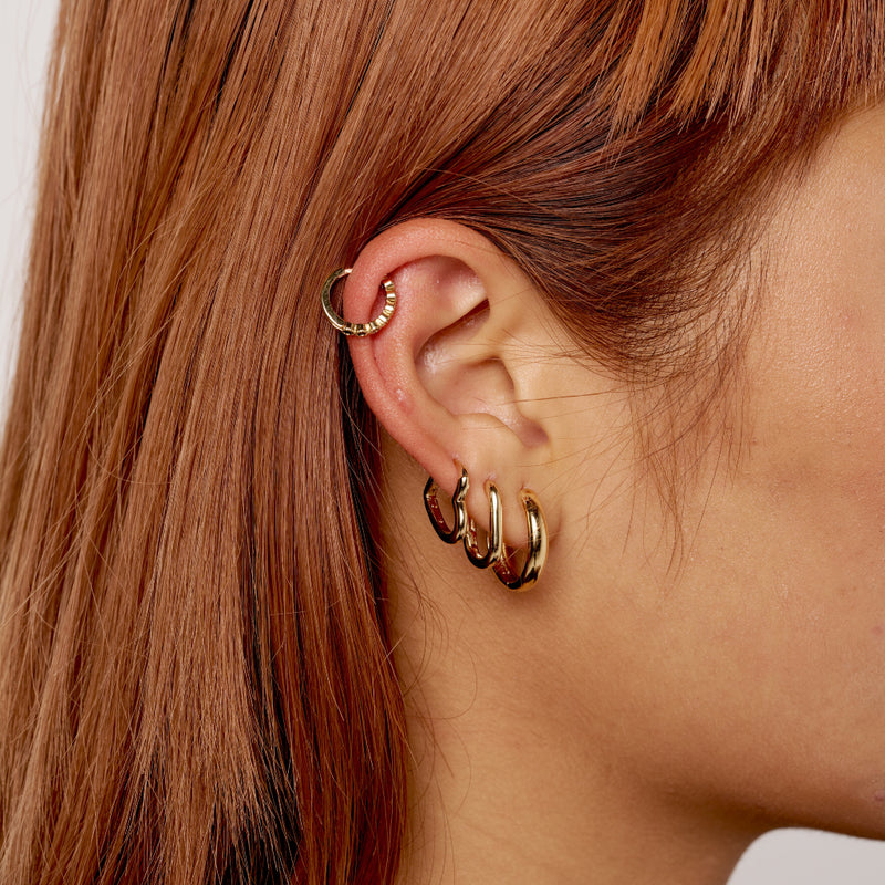 Gold Oval Huggie Hoop Earrings | Sata